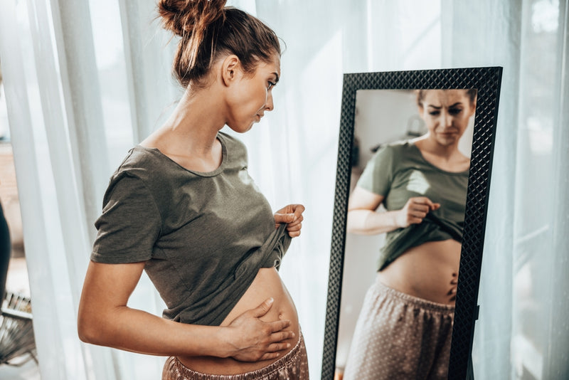 7 Reasons Why You're Experiencing Bloating and How Nutrition Coaching Can Help